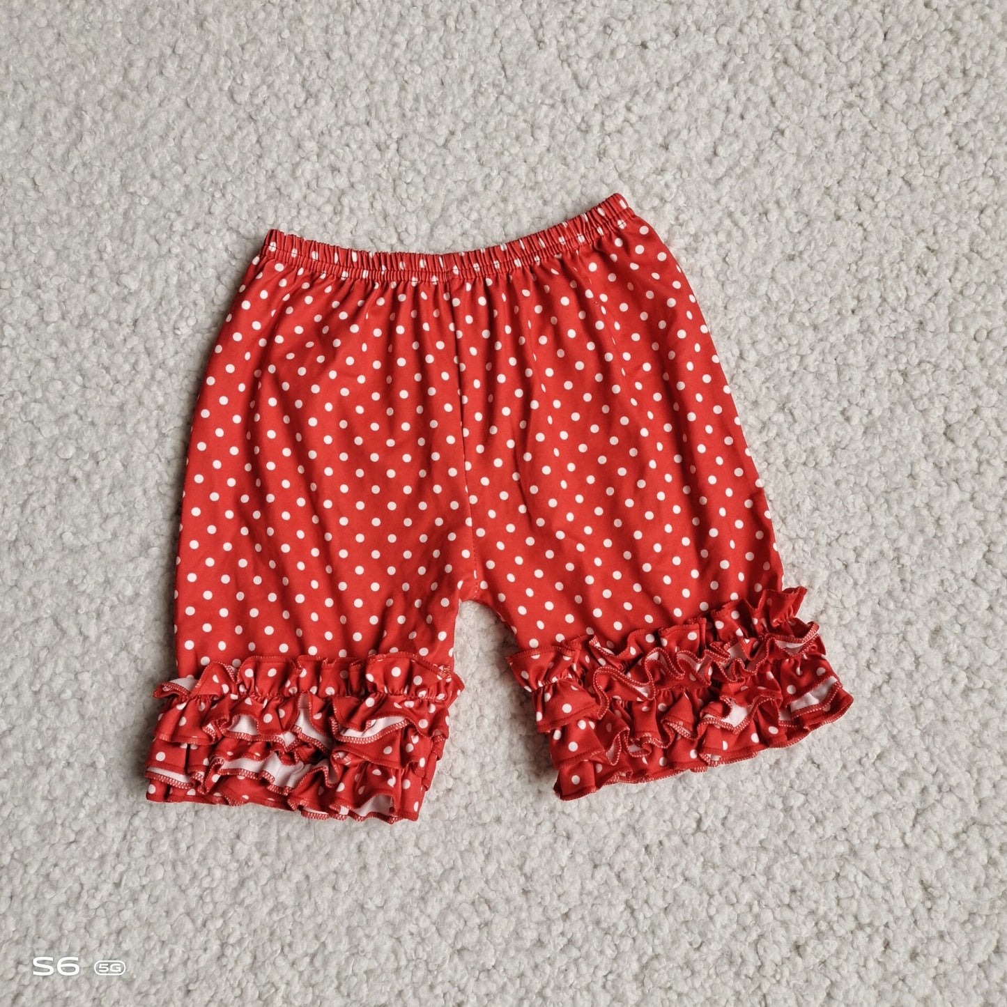 G5-4-1*.] Red shorts with white dots and lace