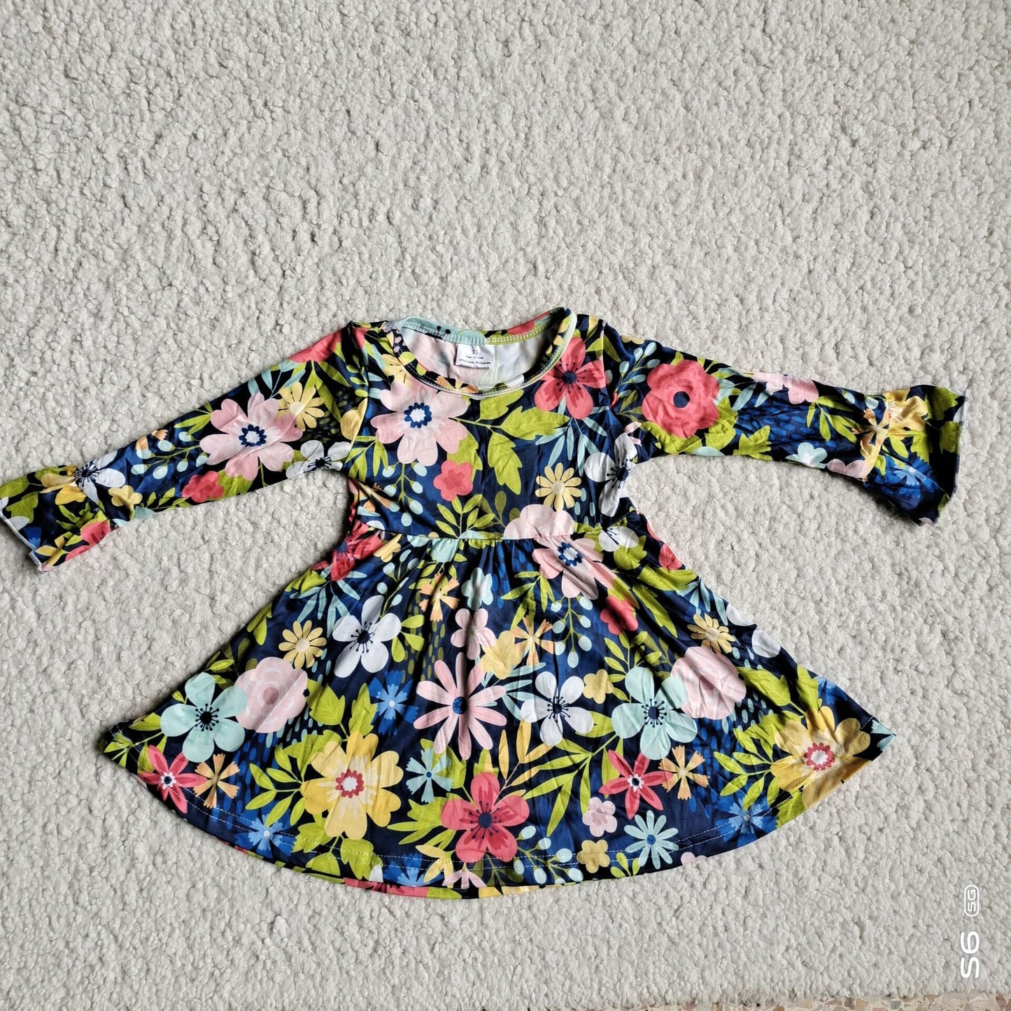 RTS NO MOQ SALES G2-24-3*'. Flowers, grass, green leaves, dark blue long-sleeved dress