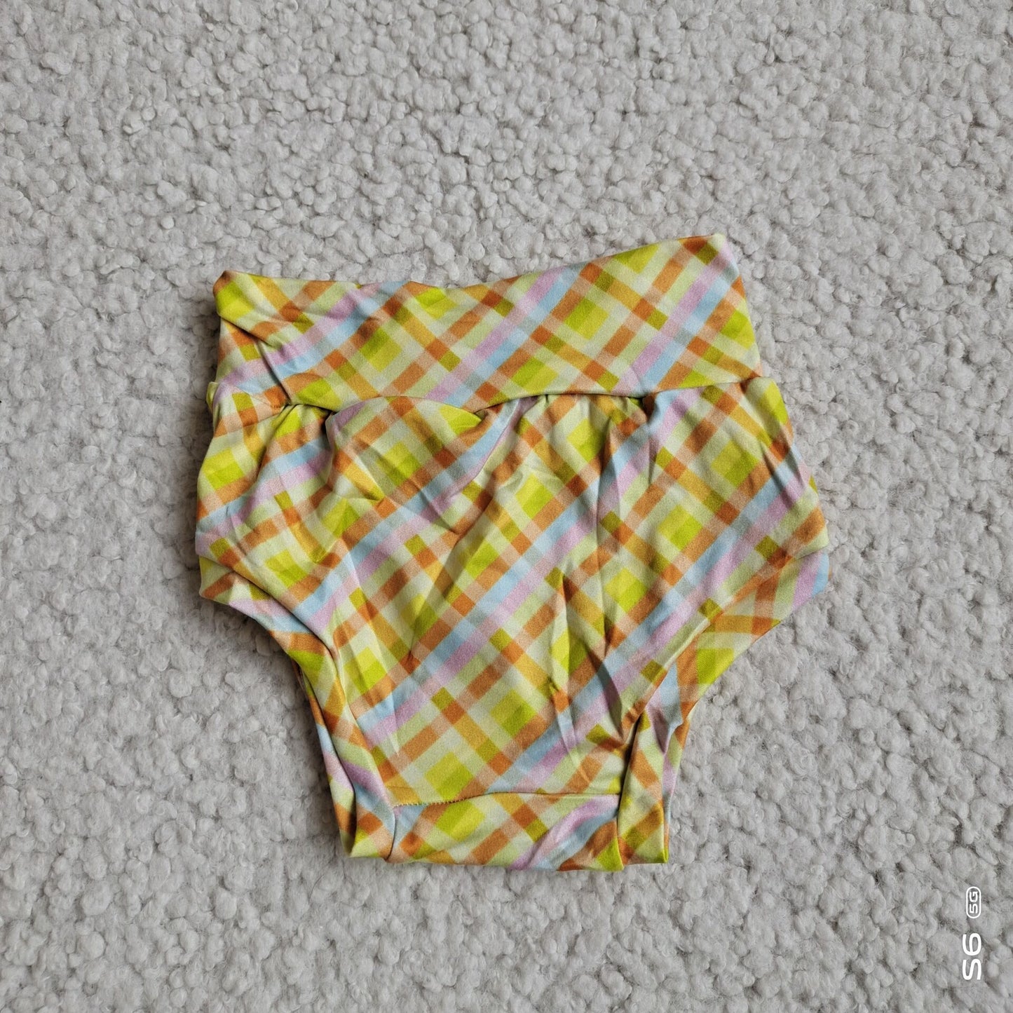 G2-8-7;*' Orange, blue and pink striped plaid thong