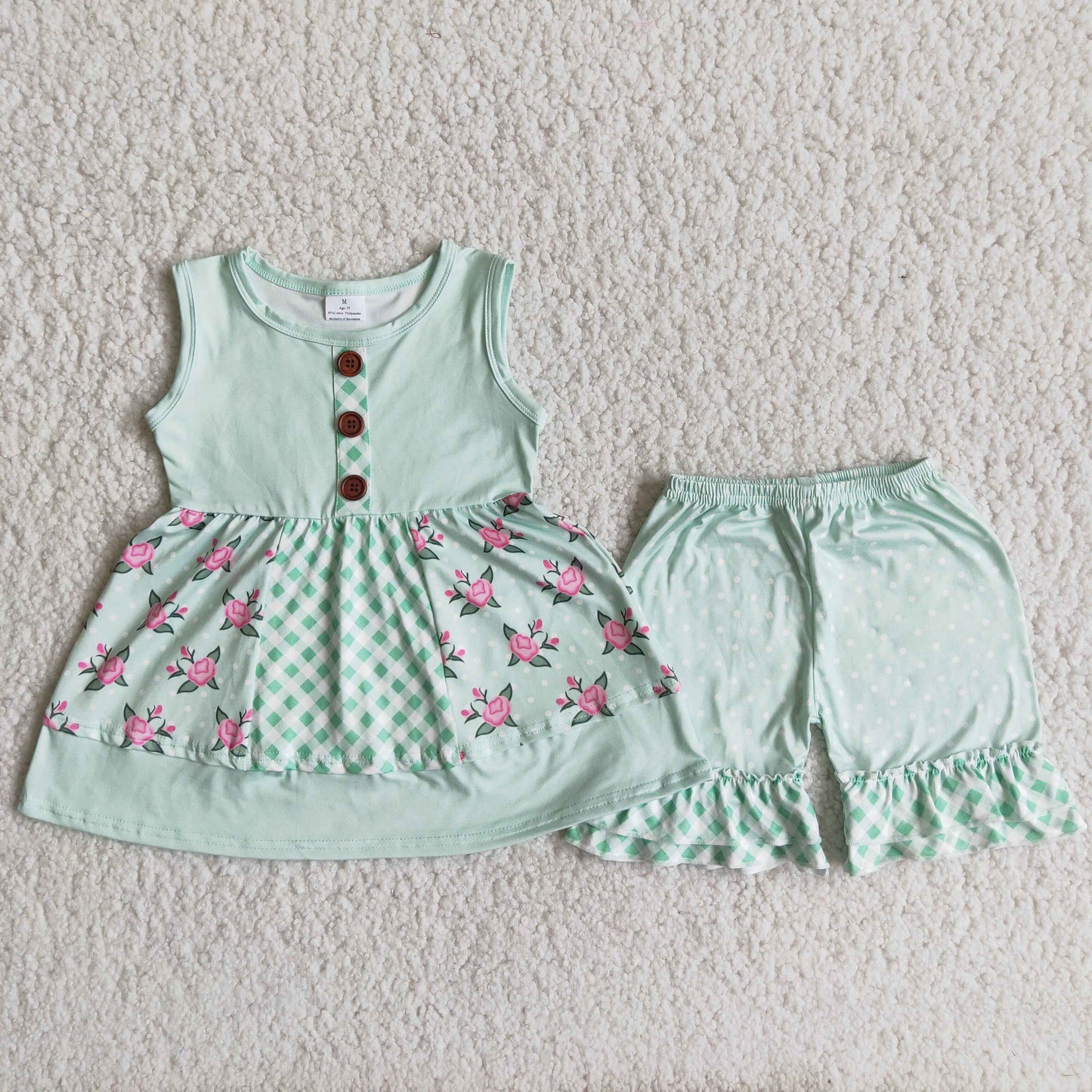 A8-16 Light green sleeveless button-down top and polka dot shorts