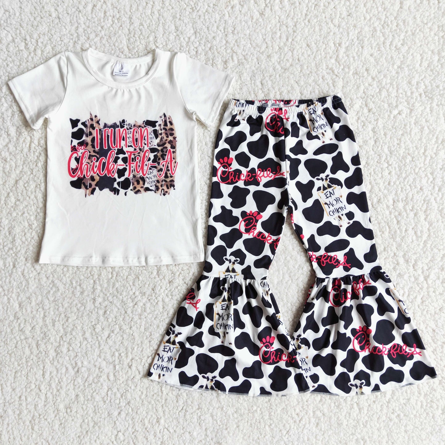 E7-2 White Short Sleeve Cow Spot Flared Pants with bow outifts