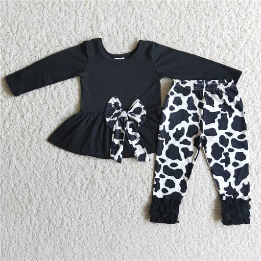 black dress top with a bow cows spot girl set